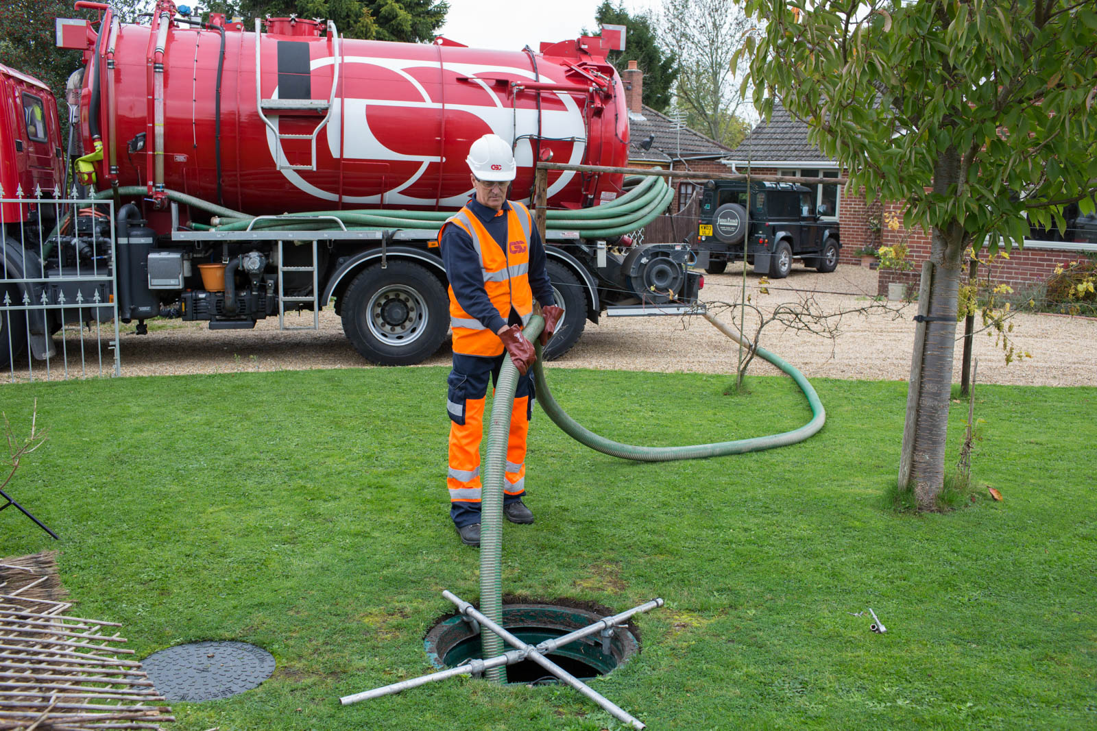 CSG Operator Emptying a Septic Tank