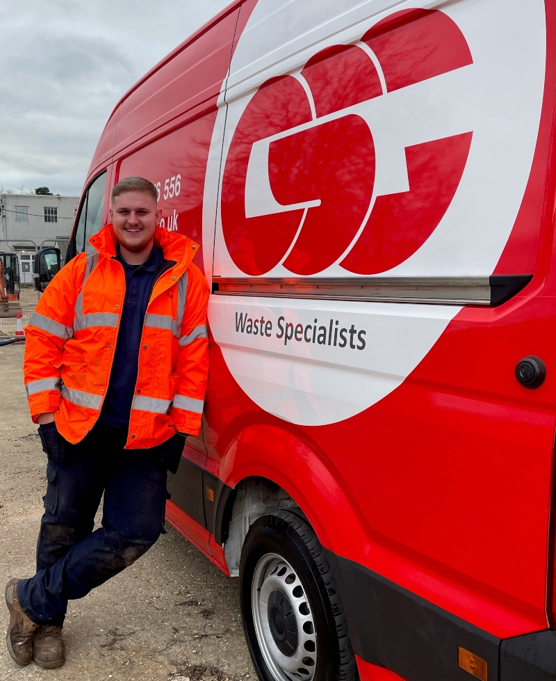 Mechanical Electrical Engineer Callum Bryant pictured leaning against a CSG van.